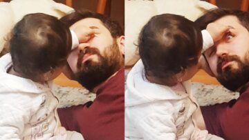 Determined-Baby-Tries-to-Open-Dads-Eyes-Adorable.jpg