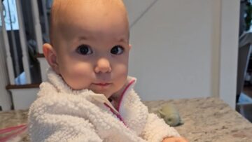 Baby-girl-completely-captivated-by-favorite-song-Adorable.jpg