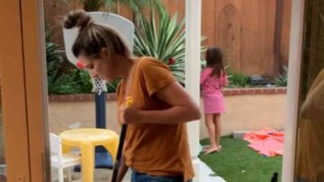 Broom-Mishap-Moms-Comedic-Chaos-Almost-Takes-Out-Daughter.jpg