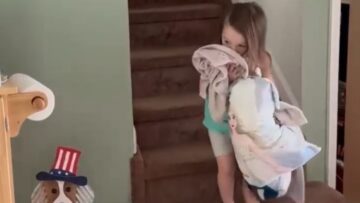 Heartwarming-Hilarity-Kid-and-Doggo-Share-the-Ultimate-Cozy-Cage.jpg