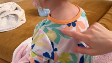 Little-girl-bursts-into-laughter-when-tickled-by-mom.jpg