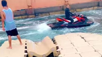Surprise-Splash-Boy-Gets-Soaked-on-Water-Bike-Ride.jpg