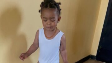 Adorable-baby-girl-cleverly-dodges-scary-puppy-toy-Super.jpg
