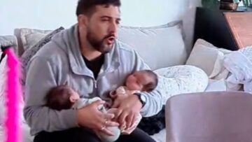 Dad-Serenades-Restless-Twins-to-Soothe-Them-Super-Cute.jpg