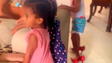 Sisters-Step-into-Mommys-Heels-Embracing-Joyful-Moments-Together.jpg