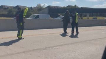 Traffic-Jam-or-Comedy-Show-Watch-This-Flipped-Truck-Steal.jpg