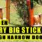 Dog struggles to fit giant stick through gate | Super Cute