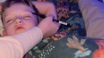 Elf-on-the-Shelf-Pulls-Off-Epic-Prank-on-Sleeping.jpg