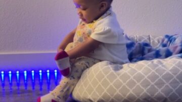 Toddler-cutely-attempts-to-cross-her-legs-Adorable.jpg